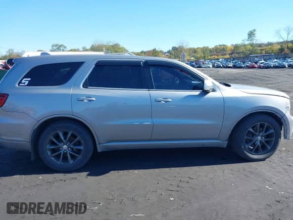 2014 Dodge Durango R/T with VIN 1C4SDJCT3EC304065, listed as a IAAI auction lot 43506074 with 193,719 mi miles and . Bid and sale history available at DreamBid. Image 13.