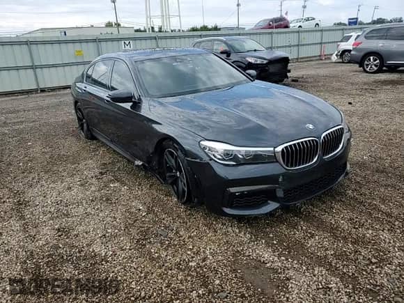 2019 BMW 7 Series 740i xDrive с VIN WBA7E4C54KGV70217, выставлен на аукционе Copart как лот 70487135 с пробегом 63 589 миль миль и Списание • Salvage title. История ставок и продаж доступна на DreamBid. Изображение 13.