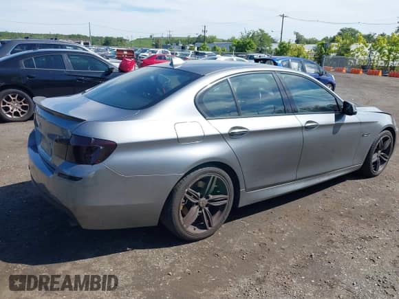 2015 BMW 5 Series 535i xDrive with VIN WBA5B3C53FD545911, listed as a IAAI auction lot 43163132 with 135,625 mi miles and . Bid and sale history available at DreamBid. Image 4.