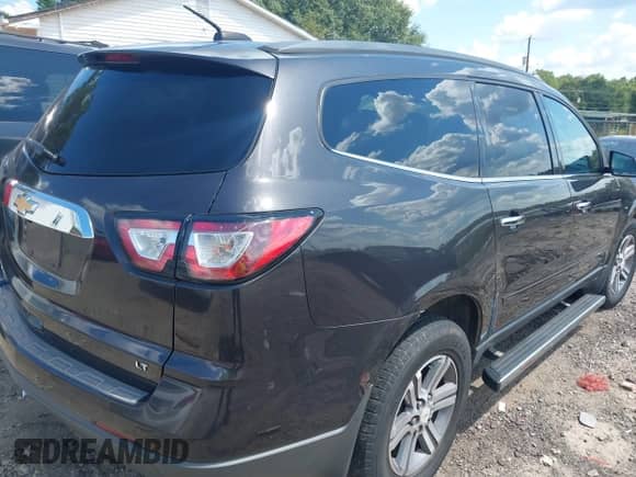 2017 Chevrolet Traverse LT with VIN 1GNKRGKD3HJ185049, listed as a IAAI auction lot 43206763 with 168,805 mi miles and . Bid and sale history available at DreamBid. Image 4.
