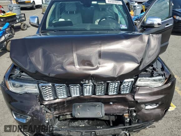 2017 Jeep Grand Cherokee Overland with VIN 1C4RJFCG4HC654896, listed as a Copart auction lot 69584085 with Not provided miles and Salvage title. Bid and sale history available at DreamBid. Image 12.