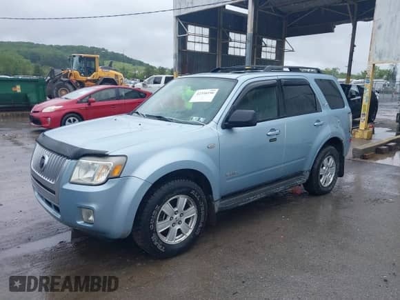 2008 Mercury Mariner with VIN 4M2CU91178KJ12057, listed as a IAAI auction lot 42358190 with 100,000 mi miles and . Bid and sale history available at DreamBid. Image 2.