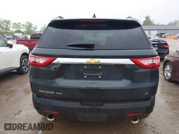 2019 Chevrolet Traverse LT Cloth z VIN 1GNEVGKW1KJ236386, wystawiony jako IAAI lot #42307729 z przebiegiem 127 675 mil mil oraz . Historia ofert i sprzedaży dostępna na DreamBid. Obrazek 16.