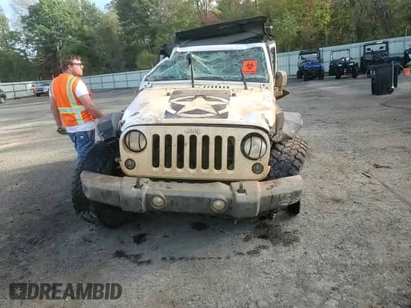 2015 Jeep Wrangler Rubicon z VIN 1C4BJWCG8FL751209, wystawiony jako Copart lot #82310754 z przebiegiem 98 022 mil mil oraz Szkoda całkowita • Salvage title. Historia ofert i sprzedaży dostępna na DreamBid. Obrazek 10.