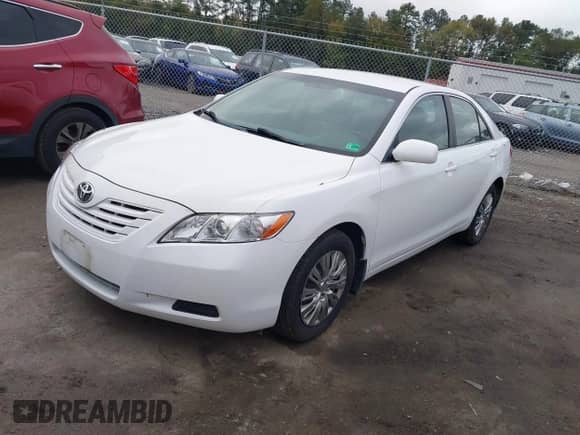 2009 Toyota Camry LE with VIN 4T1BE46K79U905833, listed as a IAAI auction lot 43443344 with 306,273 mi miles and . Bid and sale history available at DreamBid. Image 2.