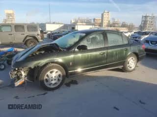 2001 Saturn SL with VIN 1G8ZK52741Z336816, listed as a Copart auction lot 46798005 with 153,642 mi miles and Salvage title. Bid and sale history available at DreamBid. Image 1.