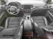 2019 Jeep Grand Cherokee Trailhawk with VIN 1C4RJFLG8KC613582, listed as a Copart auction lot 62901405 with 136,809 mi miles and Salvage title. Bid and sale history available at DreamBid. Image 8.