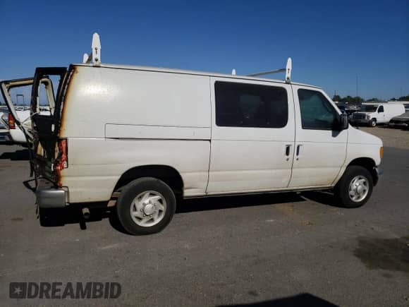 2003 Ford Econoline Cargo с VIN 1FTNE24L23HA55000, выставлен на аукционе Copart как лот 66069455 с пробегом 296 645 миль миль и Списание • Salvage title. История ставок и продаж доступна на DreamBid. Изображение 3.