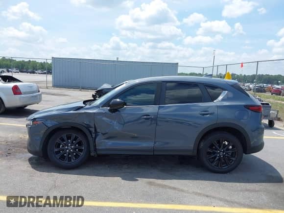 2022 Mazda CX-5 S Preferred z VIN JM3KFBCM9N0584253, wystawiony jako IAAI lot #42142889 z przebiegiem 77 104 mil mil oraz . Historia ofert i sprzedaży dostępna na DreamBid. Obrazek 14.