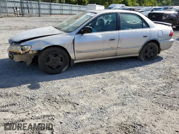 1998 Honda Accord EX with VIN 1HGCG1657WA027542, listed as a Copart auction lot 71193074 with 223,064 mi miles and Salvage title. Bid and sale history available at DreamBid. Image 1.