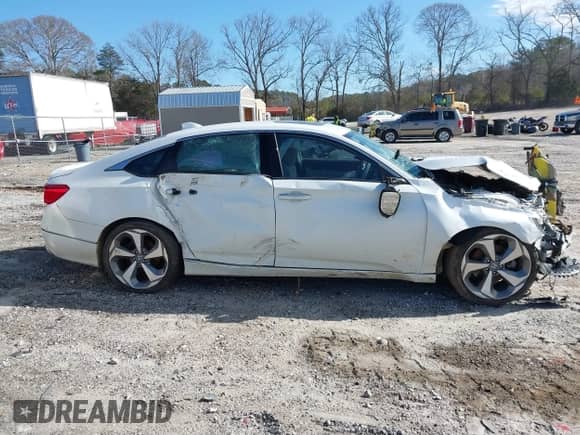 2019 Honda Accord Touring with VIN 1HGCV2F98KA010886, listed as a IAAI auction lot 41648451 with 93,959 mi miles and . Bid and sale history available at DreamBid. Image 14.