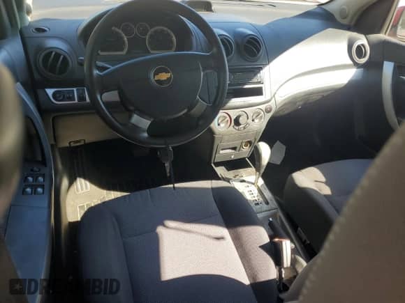 2011 Chevrolet Aveo 1LT z VIN KL1TD5DE1BB128315, wystawiony jako Copart lot #76627844 z przebiegiem 182 972 mil mil oraz Czysty tytuł • Clean title. Historia ofert i sprzedaży dostępna na DreamBid. Obrazek 8.