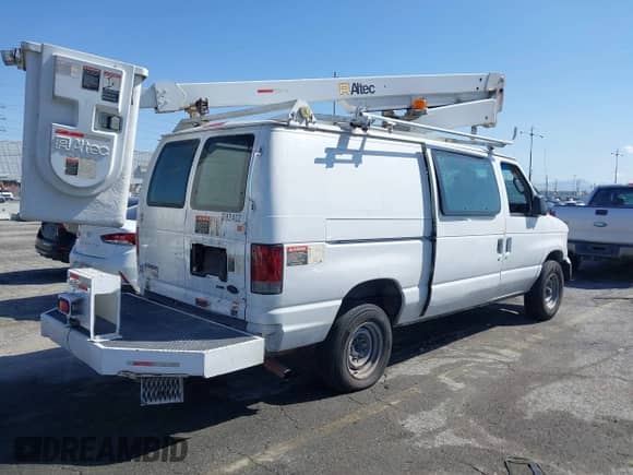 2011 Ford Econoline Cargo Commercial with VIN 1FTSE3EL6BDB29886, listed as a IAAI auction lot 41958479 with 211,787 mi miles and . Bid and sale history available at DreamBid. Image 4.