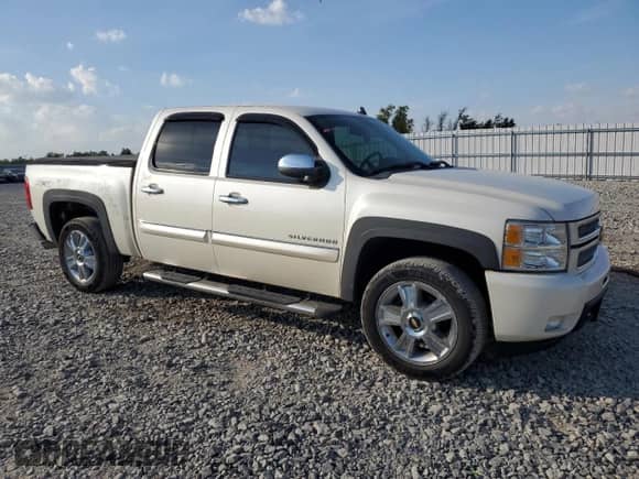 2013 Chevrolet Silverado 1500 LTZ with VIN 3GCPKTE71DG310966, listed as a Copart auction lot 82216535 with 153,969 mi miles and Clean title. Bid and sale history available at DreamBid. Image 4.