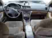 1994 Honda Accord with VIN 1HGCD5642RA166652, listed as a Copart auction lot 57225365 with 247,643 mi miles and Salvage title. Bid and sale history available at DreamBid. Image 8.