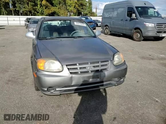 2003 Hyundai Accent GL с VIN KMHCG45C23U476391, выставлен на аукционе Copart как лот 78474264 с пробегом 155 731 миль миль и Списание • Salvage title. История ставок и продаж доступна на DreamBid. Изображение 11.