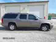 2011 Chevrolet Suburban LT z VIN 1GNSCJE09BR344091, wystawiony jako IAAI lot #43487649 z przebiegiem 182 652 mil mil oraz . Historia ofert i sprzedaży dostępna na DreamBid. Obrazek 13.