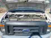 2009 Ford Econoline Cargo Commercial with VIN 1FTSE34P59DA00617, listed as a IAAI auction lot 41789890 with 26,444 mi miles and . Bid and sale history available at DreamBid. Image 10.