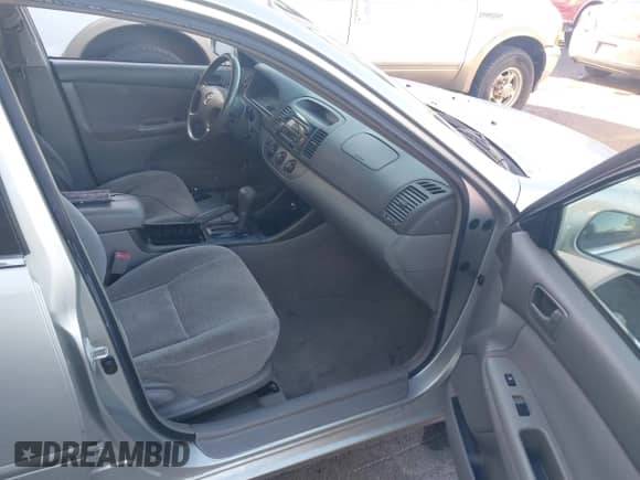 2003 Toyota Camry LE with VIN JTDBE32K130187036, listed as a IAAI auction lot 43504391 with 205,170 mi miles and . Bid and sale history available at DreamBid. Image 5.