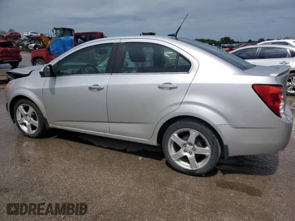 2013 Chevrolet Sonic LTZ с VIN 1G1JE5SG5D4217581, выставлен на аукционе Copart как лот 55977985 с пробегом 49 601 миль миль и Списание • Salvage title. История ставок и продаж доступна на DreamBid. Изображение 2.