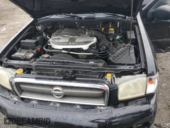 2004 Nissan Pathfinder SE z VIN JN8DR09Y94W920605, wystawiony jako Copart lot #69293925 z przebiegiem 205 341 mil mil oraz Szkoda całkowita • Salvage title. Historia ofert i sprzedaży dostępna na DreamBid. Obrazek 12.