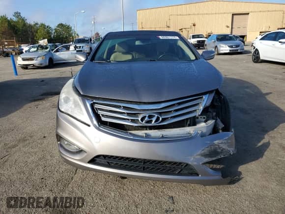 2013 Hyundai Azera с VIN KMHFH4JG6DA312812, выставлен на аукционе Copart как лот 86901174 с пробегом 256 370 миль миль и Списание • Salvage title. История ставок и продаж доступна на DreamBid. Изображение 5.