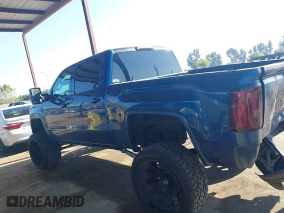 2017 GMC Sierra 1500 SLE with VIN 3GTU2MEC8HG345855, listed as a IAAI auction lot 42004600 with 104,767 mi miles and . Bid and sale history available at DreamBid. Image 14.