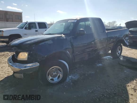 2000 Ford F-150 XL with VIN 1FTRX18W0YKA46560, listed as a Copart auction lot 46865705 with 237,884 mi miles and Salvage title. Bid and sale history available at DreamBid. Image 1.