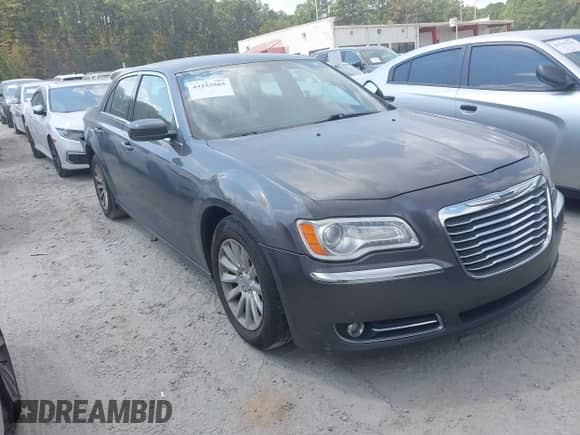 2013 Chrysler 300 with VIN 2C3CCAAG3DH588343, listed as a IAAI auction lot 43153565 with 169,165 mi miles and . Bid and sale history available at DreamBid. Image 1.