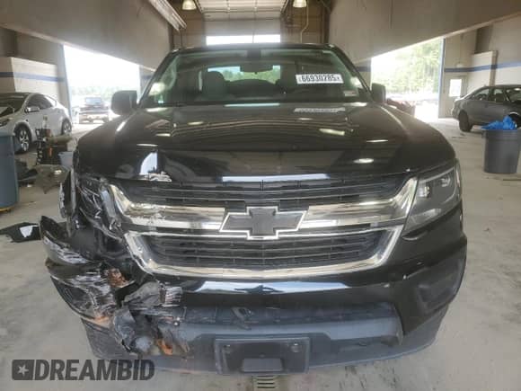 2017 Chevrolet Colorado 4WD WT с VIN 1GCHTBEN1H1140543, выставлен на аукционе Copart как лот 66930285 с пробегом 123 087 миль миль и Списание • Salvage title. История ставок и продаж доступна на DreamBid. Изображение 5.