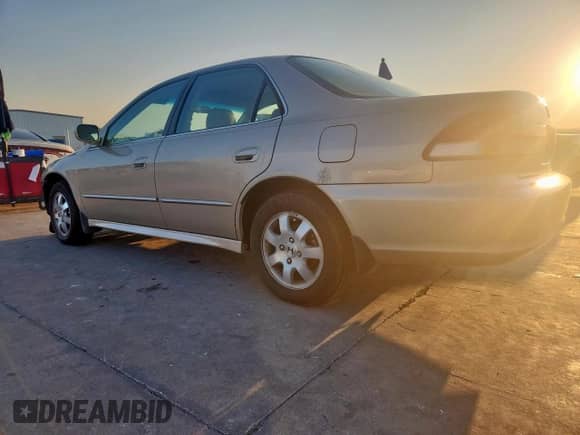 2002 Honda Accord EX с VIN 1HGCG56642A156302, выставлен на аукционе Copart как лот 72039165 с пробегом 58 575 миль миль и Списание • Salvage title. История ставок и продаж доступна на DreamBid. Изображение 2.