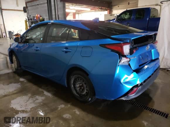 2020 Toyota Prius L Eco with VIN JTDKARFUXL3110965, listed as a Copart auction lot 81241595 with 94,776 mi miles and Clean title. Bid and sale history available at DreamBid. Image 2.