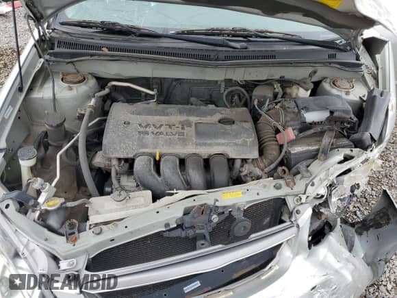 2004 Toyota Corolla CE с VIN 1NXBR32E64Z280381, выставлен на аукционе Copart как лот 66693145 с пробегом Не указан миль и На запчасти • Non repairable. История ставок и продаж доступна на DreamBid. Изображение 11.