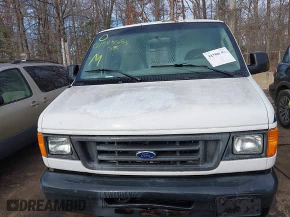 2006 Ford Econoline Cargo with VIN 1FTNE24L46HB44670, listed as a IAAI auction lot 41588655 with 242,849 mi miles and . Bid and sale history available at DreamBid. Image 12.