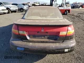 1999 Saturn SC z VIN 1G8ZR1274XZ262181, wystawiony jako Copart lot #75931774 z przebiegiem Nie podano mil oraz Szkoda całkowita • Salvage title. Historia ofert i sprzedaży dostępna na DreamBid. Obrazek 6.
