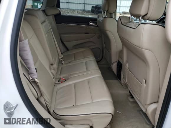 2016 Jeep Grand Cherokee Overland z VIN 1C4RJFCG7GC409038, wystawiony jako Copart lot #86667295 z przebiegiem 192 065 mil mil oraz Czysty tytuł • Clean title. Historia ofert i sprzedaży dostępna na DreamBid. Obrazek 11.