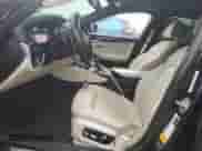 2018 BMW 5 Series M550i xDrive with VIN WBAJB9C54JB035699, listed as a Copart auction lot 71395105 with 94,373 mi miles and Salvage title. Bid and sale history available at DreamBid. Image 7.