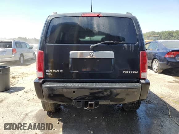 2011 Dodge Nitro Shock z VIN 1D4PU7GX5BW501225, wystawiony jako Copart lot #68369974 z przebiegiem 299 262 mil mil oraz Szkoda całkowita • Salvage title. Historia ofert i sprzedaży dostępna na DreamBid. Obrazek 6.