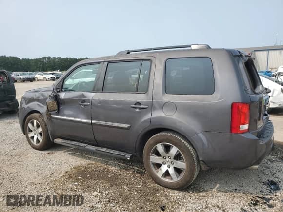 2015 Honda Pilot Touring с VIN 5FNYF3H96FB011875, выставлен на аукционе Copart как лот 59057085 с пробегом 165 328 миль миль и Списание • Salvage title. История ставок и продаж доступна на DreamBid. Изображение 2.