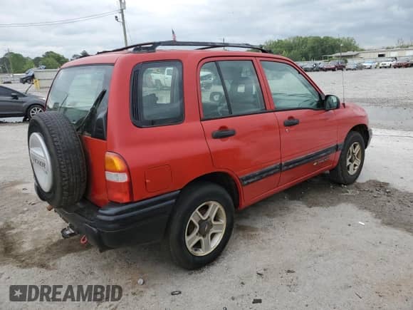 2002 Chevrolet Tracker с VIN 2CNBJ13C326929705, выставлен на аукционе Copart как лот 52778055 с пробегом Не указан миль и Списание • Salvage title. История ставок и продаж доступна на DreamBid. Изображение 3.