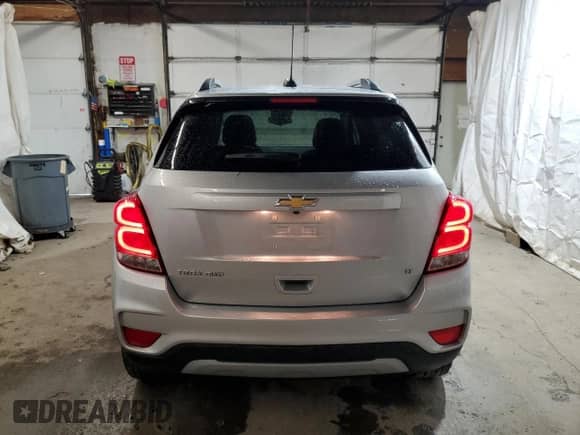 2018 Chevrolet Trax LT z VIN KL7CJPSB0JB598210, wystawiony jako Copart lot #82758605 z przebiegiem 84 584 mil mil oraz Szkoda całkowita • Salvage title. Historia ofert i sprzedaży dostępna na DreamBid. Obrazek 6.