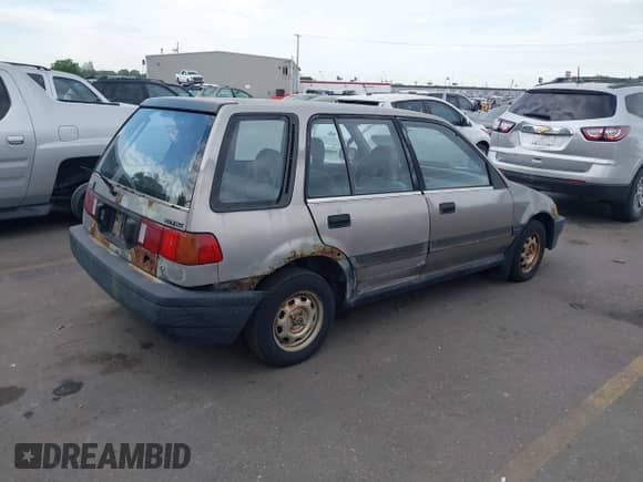 1990 Honda Civic z VIN JHMEE2857LS005562, wystawiony jako IAAI lot #42476332 z przebiegiem 241 183 mil mil oraz . Historia ofert i sprzedaży dostępna na DreamBid. Obrazek 4.