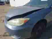 2004 Toyota Camry LE z VIN 4T1BE32K64U864149, wystawiony jako IAAI lot #43506229 z przebiegiem 258 457 mil mil oraz . Historia ofert i sprzedaży dostępna na DreamBid. Obrazek 6.