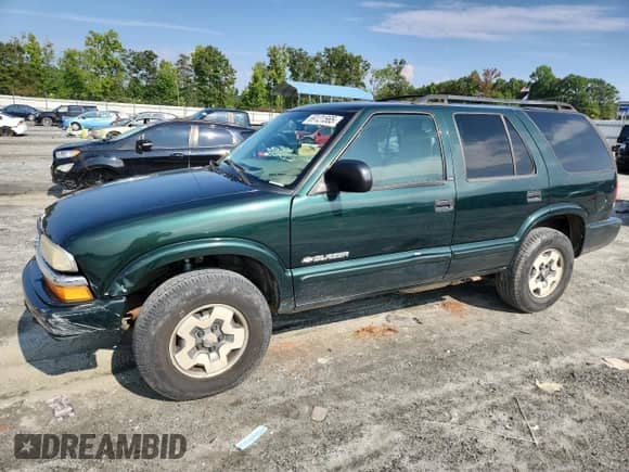 2002 Chevrolet Blazer LS with VIN 1GNDT13W42K208122, listed as a Copart auction lot 69121565 with 111,706 mi miles and Salvage title. Bid and sale history available at DreamBid. Image 1.