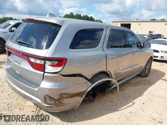 2014 Dodge Durango R/T with VIN 1C4SDHCT0EC590904, listed as a IAAI auction lot 42758420 with 163,982 mi miles and . Bid and sale history available at DreamBid. Image 4.