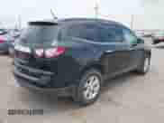 2014 Chevrolet Traverse LT z VIN 1GNKRHKD1EJ318053, wystawiony jako IAAI lot #42562508 z przebiegiem 93 544 mil mil oraz . Historia ofert i sprzedaży dostępna na DreamBid. Obrazek 4.