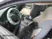 2001 Saturn SC with VIN 1G8ZP12851Z215716, listed as a Copart auction lot 69665754 with Not provided miles and Salvage title. Bid and sale history available at DreamBid. Image 7.