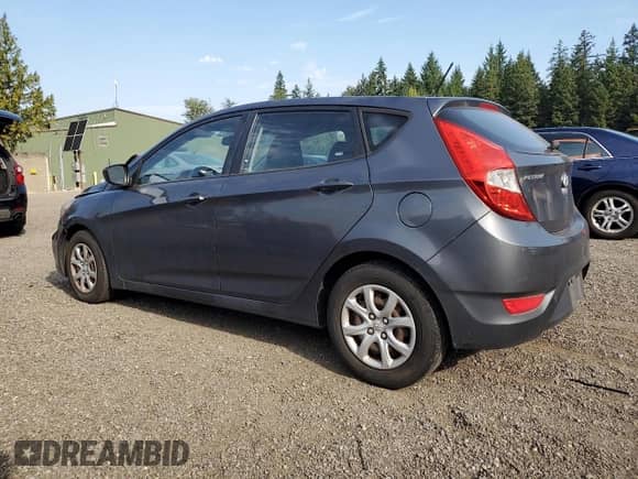 2012 Hyundai Accent GS with VIN KMHCT5AE7CU011159, listed as a Copart auction lot 70052815 with 156,055 mi miles and Salvage title. Bid and sale history available at DreamBid. Image 2.