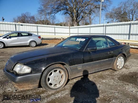 1992 Mercedes-Benz SL с VIN WDBFA66E4NF042381, выставлен на аукционе Copart как лот 43774115 с пробегом 184 128 миль миль и Чистый • Clean title. История ставок и продаж доступна на DreamBid. Изображение 1.