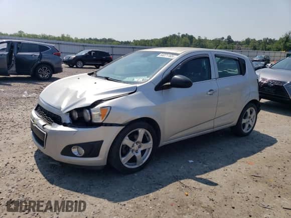 2012 Chevrolet Sonic LTZ с VIN 1G1JF6SBXC4214438, выставлен на аукционе Copart как лот 64071165 с пробегом 152 503 миль миль и Списание • Salvage title. История ставок и продаж доступна на DreamBid. Изображение 1.